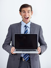 Image showing Laptop, mockup and happy with portrait of man in studio for website, email and administration. Business, excited and technology with employee in white background for corporate, internet or networking