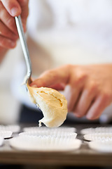 Image showing Closeup, hands and cupcake dough in tray with baker, small business owner and professional chef. Cooking, bakery and cake in baking pan for food, job and start process for muffins in shop kitchen