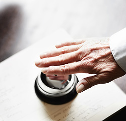 Image showing Bell, ring and person hands for hospitality, customer services and receptionist desk for information. Senior help, support and elderly people press sound for attention, registration and hotel booking