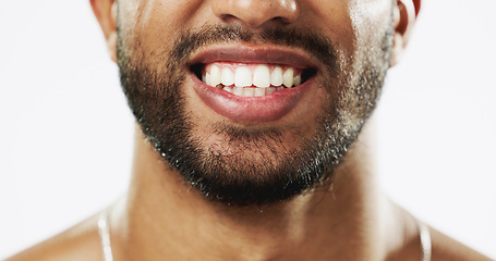 Image showing Dental, teeth and smile of Indian man in studio for beauty, cleaning and self care. Oral hygiene, natural and cosmetic treatment with male model isolated on white background for veneers, fresh or res