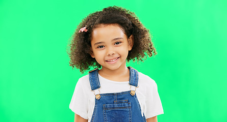 Image showing Happy, little girl and green screen with smile of cute innocent child isolated against a studio background. Portrait of adorable female kid smiling with teeth for childhood youth on chromakey mockup