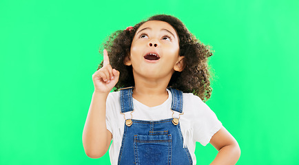 Image showing Idea, thinking and child pointing up at mockup space or green screen isolated against a studio background. Portrait, cute and smart, clever and intelligent kid or young person for brand placement