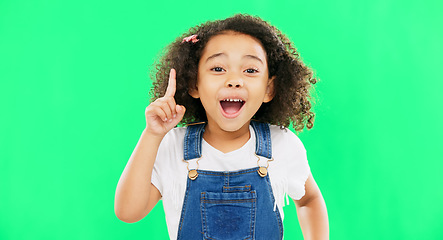 Image showing Idea, thinking and child pointing up at mockup space or green screen isolated against a studio background. Portrait, cute and smart, clever and intelligent kid or young person for brand placement