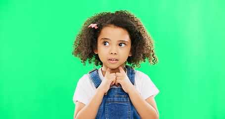 Image showing Child, thinking and nervous girl on green screen background with hands on chin and confused face. Black kid in studio with space for mockup wondering about question, doubt and idea or think emoji