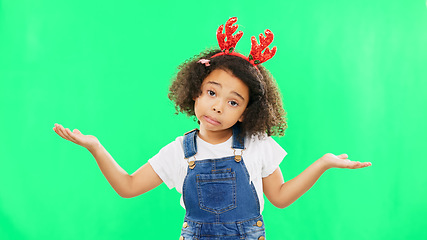 Image showing Shrug, green screen and face of a child with a gesture isolated on a studio background. Confused, doubt and a portrait of a girl kid gesturing for choice, decision and indecision with mockup