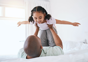 Image showing Airplane, game and father with daughter in bedroom for morning, wake up and weekend. Happy, excited and funny with man and young girl playing in family home for happiness, freedom and support