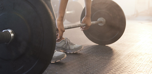 Image showing Fitness, woman in gym and barbell for weightlifting, power and muscle with closeup on equipment at sports club. Balance, strength and female bodybuilder lifting weights and training with health goals