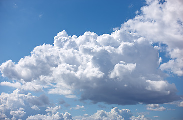 Image showing Nature, space and climate with clouds in blue sky for heaven, peace and environment. Sunshine, mockup and dream with fluffy cloudscape in ozone air for freedom, pattern and weather meteorology