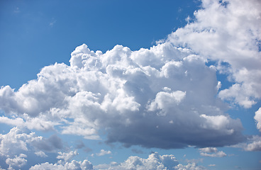 Image showing Nature, space and weather with clouds in blue sky for heaven, peace and climate. Sunshine, mockup and dream with fluffy cloudscape in ozone air for freedom, pattern and environment meteorology