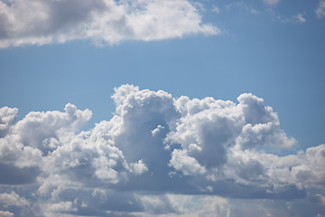 Image showing Nature, space and sunshine with clouds in blue sky for heaven, peace and climate. Environment, mockup and dream with fluffy cloudscape in ozone air for freedom, pattern and weather meteorology