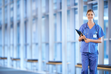 Image showing Healthcare, portrait of woman doctor and clipboard standing in a hospital smiling for protection. Nursing, health wellness female nurse or surgeon smile for happiness with a patients chart at clinic