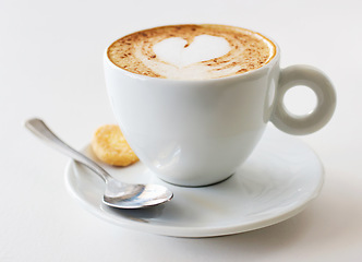 Image showing Coffee cup, latte and art in restaurant creativity, customer service and hospitality or food industry background. Cafe shop, closeup, espresso drink and inspiration, creative heart design and cream