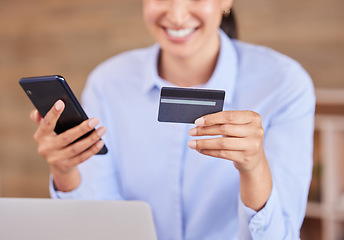 Image showing Business woman, phone and credit card for online shopping, payment or banking at the office. Happy female person, shopper or employee with smile in ecommerce on mobile smartphone at the workplace