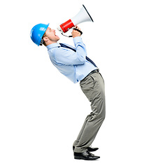 Image showing Construction worker, engineer and a man shouting into a megaphone in studio isolated on a white background. Architect, builder and a male designer screaming during a project for property development