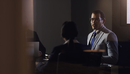 Image showing Dark boardroom meeting, team and corporate man, leader or law firm CEO speaking to business director group. Teamwork collaboration, communication and professional lawyer cooperation on legal report