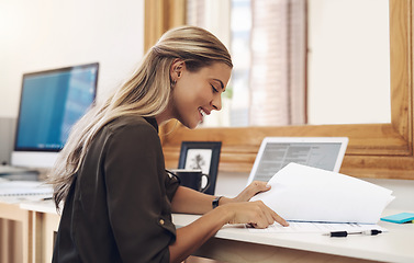 Image showing Paperwork, business woman and accountant reading report for information, financial data or analysis. Documents, auditor and happy female professional check contract, review and bookkeeping in office.