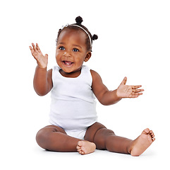 Image showing Baby, girl and smile with infant, excited and cheerful isolated against a white studio background. Female child, kid on the floor and adorable toddler with joy, relax and growth with newborn and care