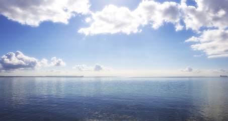 Image showing Seascape, cloud and sky with space in outdoor with mockup in south africa for travel in summer. Water, environment and calm or ocean with horizon in background for holiday or banner in nature.