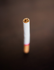 Image showing Cigarette, tobacco and smoking addiction as abstract background with pollution of cancer risk. Toxic, smoke and nicotine object or product closeup to quit, stop and prevent lung disease