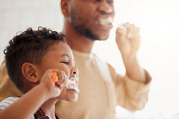 Image showing Brushing teeth, child and dad in a home bathroom for dental health and wellness. Face of a man and african kid learning to clean mouth with a toothbrush and toothpaste for oral hygiene and self care