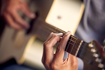 Image showing Playing guitar, music and hands of a man on an instrument, learning and strumming for entertainment. Jazz, talent and closeup of a male musician with acoustic music, practicing and instrumental hobby