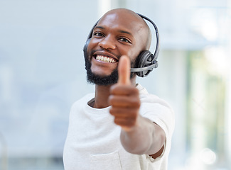 Image showing Call center, portrait and man thumbs up, success and thank you or like, yes and winning in office support or communication. Agent face, consultant or african person for thanks, okay or good job emoji