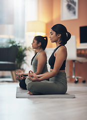 Image showing Friends, meditation and zen women together in a house for mindfulness, health and relax wellness. Indian sisters or female family meditate in lounge for yoga, lotus and mental health balance at home