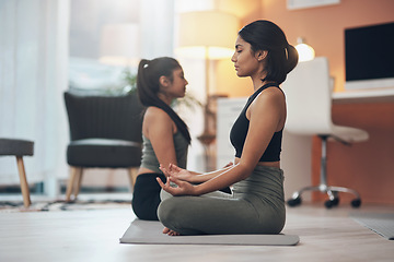 Image showing Friends, meditation and women exercise together in a house with mindfulness, health and wellness. Indian sisters or female family meditate in a lounge for yoga workout, lotus and fitness with partner