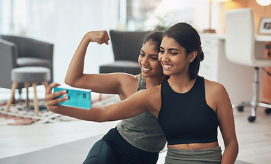 Image showing Fitness, friends and strong muscle selfie of women together at home for social media memory or post. Indian sisters or female family with photo for influencer update, workout motivation or results