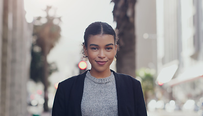 Image showing Corporate, portrait and business woman in city for morning, professional or focus. Confident, smile and natural with face of female employee in urban outdoors for entrepreneurship, happy or pride