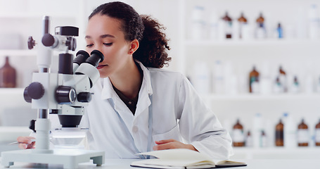 Image showing Research, microscope and woman scientist writing for science, medicine and data analysis in a lab. Laboratory, healthcare and female health expert with book for medical, results and sample checklist