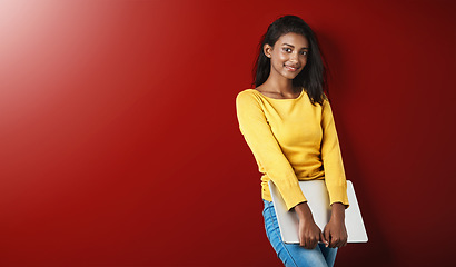 Image showing Happy woman, student and studio portrait with a laptop for university and school work with mockup. Isolated, gray background and education of Indian female person with smile and computer for college