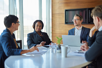 Image showing Meeting, group and professional with brainstorming or planning at the office with technology. Business people, strategy and discussion for project for collaboration in corporate company with tech.