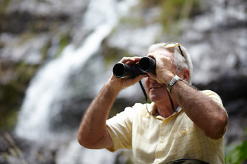 Image showing Binoculars, forest and man explore in forest of travel, journey or outdoor adventure and carbon footprint tourism. Watch, search and senior person birdwatching in nature, mountains or eco environment