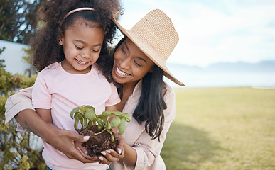 Image showing Gardening, mother and child with plant in hands learning environmental, organic and nature skills together. Landscaping, family and happy girl with mom ready for planting sprout in soil for growth
