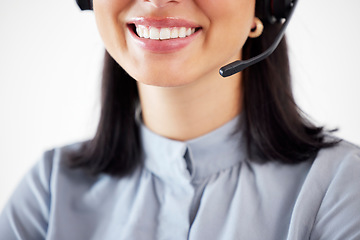 Image showing Agent call center, closeup mouth of a woman and with a headset at her modern office. Consultant or customer service, support or networking and crm with a female person smile at her workstation