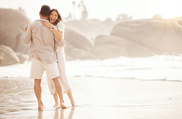 Image showing Beach, dancing and happy couple with love, hug and summer celebration, holiday or vacation. Woman with partner or people dance, celebrate and excited in ocean or sea, travel happiness and laughing