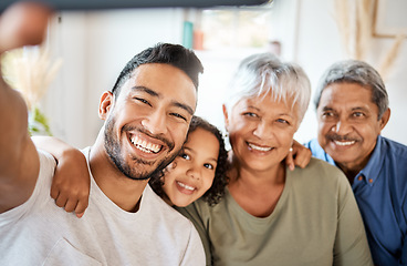 Image showing Happy family, portrait smile and selfie in living room for social media, vlog or online post at home. Grandparents, father and child smiling for photo, memory or profile picture together on holiday