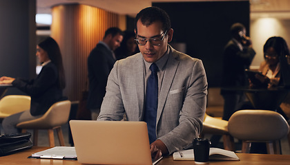 Image showing Laptop, corporate lounge and business man focus on company project, online analysis or typing email. Lobby, website and professional person doing research, internet search or working on night report