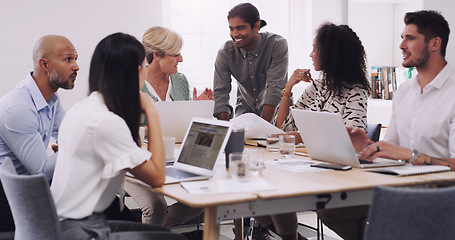 Image showing Talking, staff and group in a meeting, planning and discussion with teamwork, partnership or collaboration. Business people, team or men with women, laptop or documents with conversation and creative