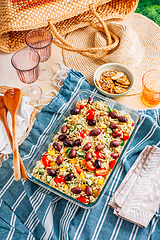 Image showing Picnic time - homemade orzo pasta salad with feta, olives, tomatoes