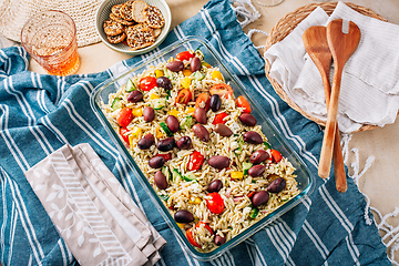 Image showing Picnic time - homemade orzo pasta salad with feta, olives, tomatoes