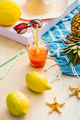 Image showing Summer holiday concept, summer accessories with refreshing juice and fresh fruits