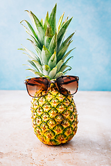 Image showing Summer concept - Pineapple hipster in sunglasses, creative art fashionable vacation concept