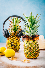 Image showing Summer concept - Pineapple hipster in sunglasses with summer fruits, creative art fashionable vacation concept