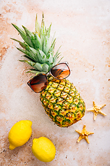 Image showing Summer concept - Pineapple hipster in sunglasses, creative art fashionable vacation concept