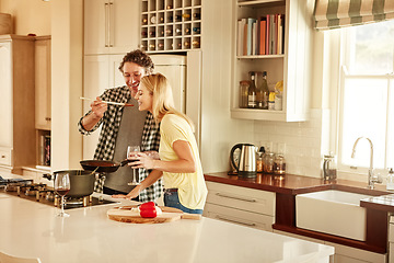 Image showing Taste, love or couple kitchen cooking with healthy food for lunch or dinner together at home in Sydney. Tasting, smile or woman eating or smiling with mature husband in meal prep in Australia