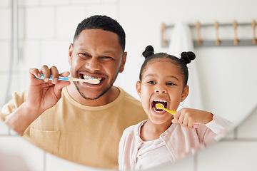 Image showing Child, father and brushing teeth in a family home bathroom for dental health and wellness in a mirror. Face of african man and girl kid learning to clean mouth with a toothbrush for oral hygiene