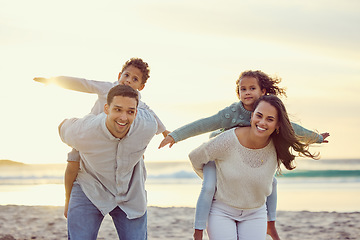 Image showing Mother, father and kids piggyback on beach for family holiday, summer vacation and weekend. Nature, travel and portrait of happy mom, dad and child playing by ocean for bonding, fun and quality time