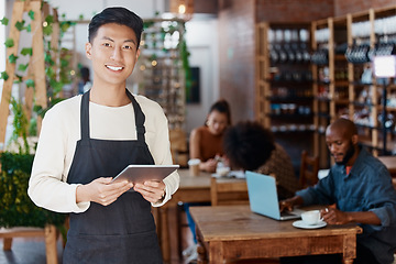 Image showing Restaurant, tablet and portrait of man or small business owner, e commerce and cafe or coffee shop management. Happy waiter or Asian person with sales on digital technology or internet for startup